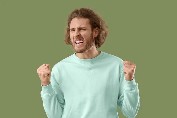 Angry Young Man Sweatshirt Green Background — Stock Photo, Image