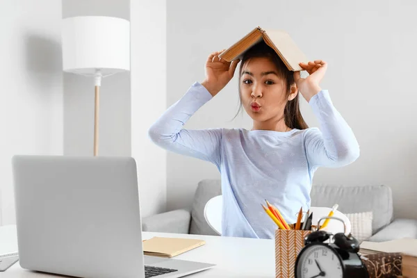 Funny Little Asian Girl Studying Literature Online Tutor Home — Stock Photo, Image