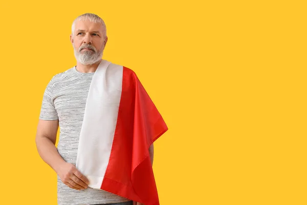 Mature Man Flag Poland Yellow Background — Stock Photo, Image