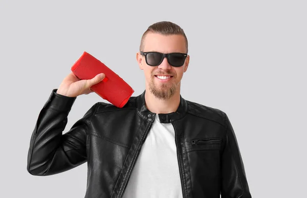 Man Holding Wireless Portable Speaker Grey Background — Stock Photo, Image