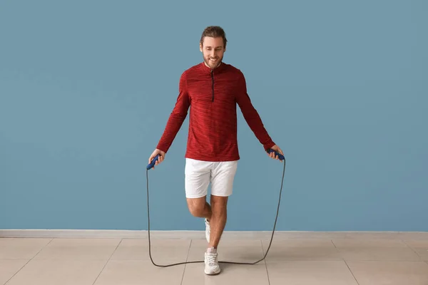 Sporty Man Jumping Rope Color Background — Stock Photo, Image