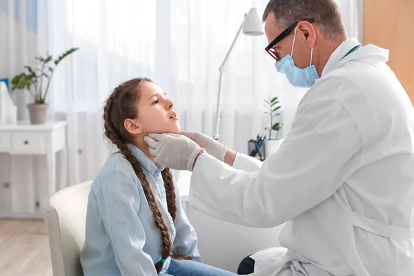 Doctor Examining Little Girl Neck Clinic — Stock Photo, Image