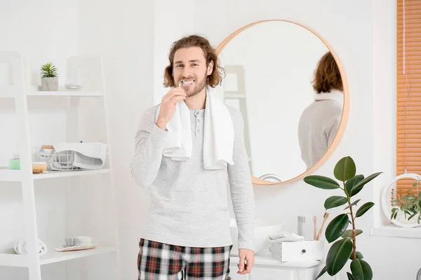 Handsome Young Man Brushing Teeth Bathroom — Stock Photo, Image