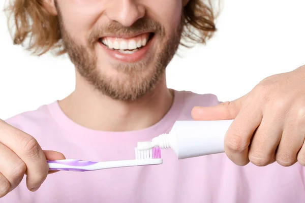 Young Man Applying Tooth Paste Brush White Background Closeup — Stock Photo, Image