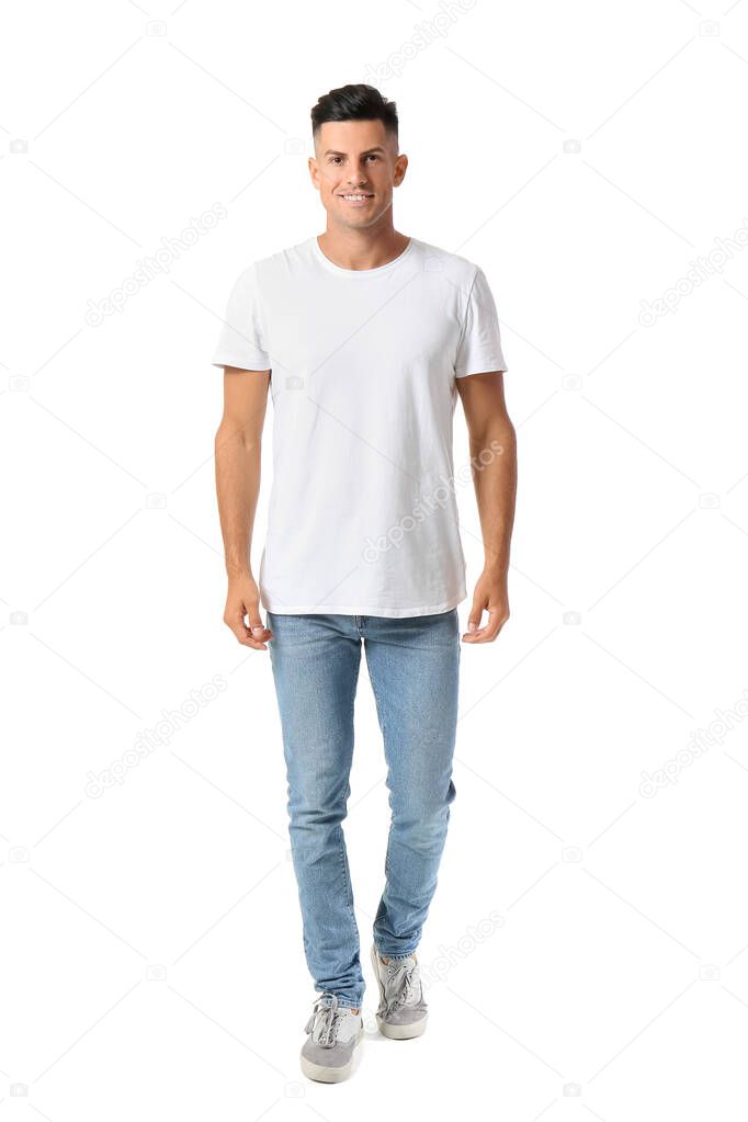 Handsome young man in stylish t-shirt isolated on white