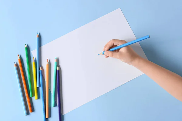 Child Hand Blank Sheet Paper Different Pencils Color Background — Stock Photo, Image