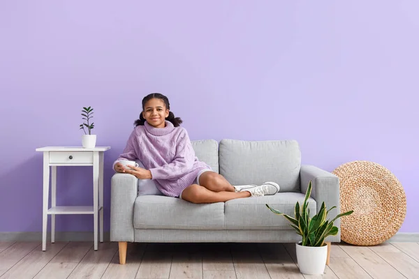 African American Teenage Girl Drinking Tea While Sitting Sofa Home — Stock Photo, Image