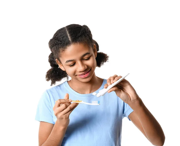 African American Teenage Girl Applying Tooth Paste Brush White Background — Stock Photo, Image