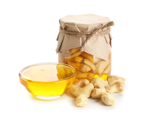 Jar Tasty Cashew Nuts Honey White Background — Stock Photo, Image