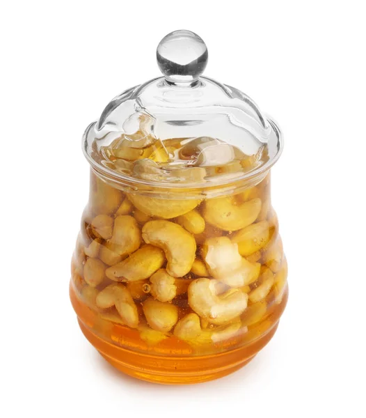Pot Smakelijke Cashewnoten Met Honing Witte Achtergrond — Stockfoto