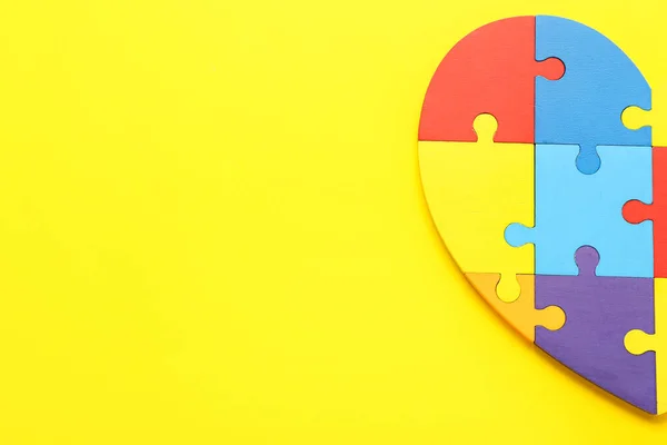 Heart Made Colorful Puzzle Pieces Yellow Background Concept Autistic Disorder — Stock Photo, Image