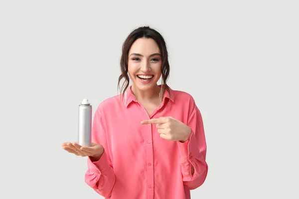 Pretty Young Woman Hair Spray Grey Background — Stock Photo, Image