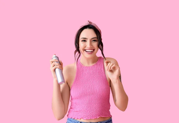 Pretty Young Woman Hair Spray Pink Background — Stock Photo, Image