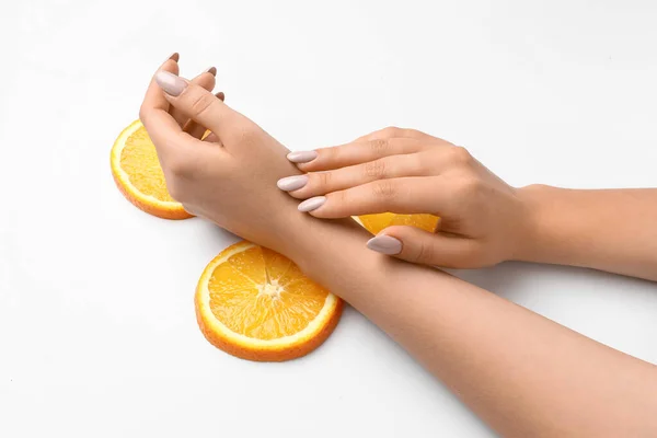 Female Hands Beautiful Manicure Orange Slices White Background — Stock Photo, Image