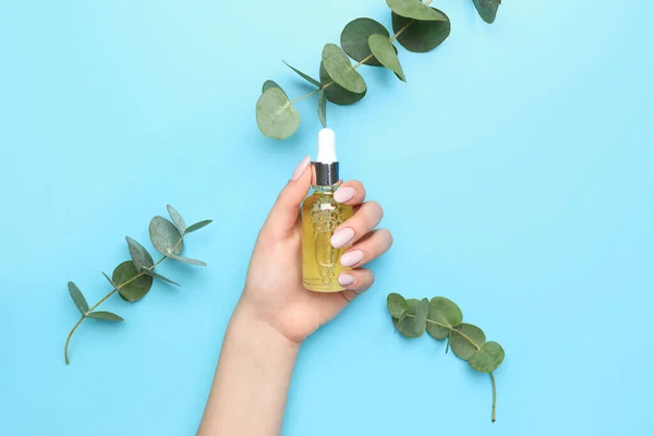 Woman Beautiful Manicure Holding Bottle Essential Oil Eucalyptus Branches Blue — Stock Photo, Image