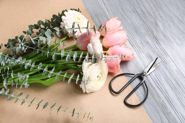 Beautiful Flowers Wrapping Paper Scissors Grey Wooden Background — Stock Photo, Image