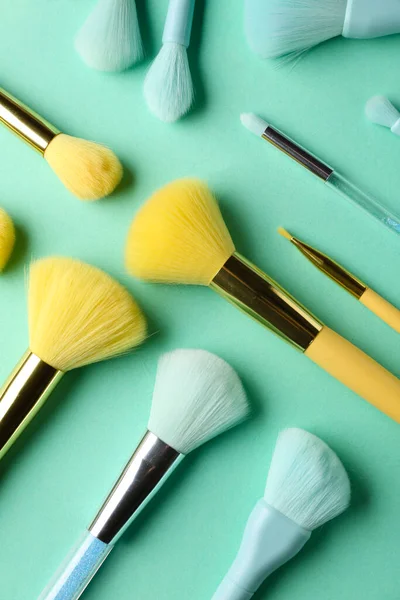 Set Makeup Brushes Blue Background Top View — Stock Photo, Image