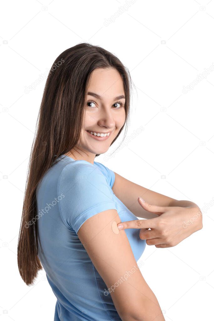 Happy woman with applied nicotine patch on white background. Smoking cessation