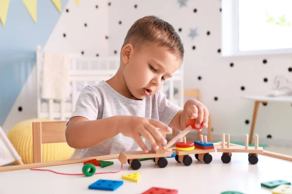 Cute Little Boy Playing Wooden Toys Table Room — Stock Photo, Image