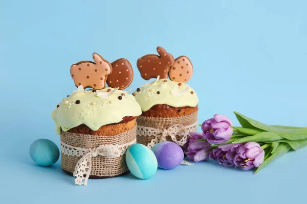 Delicious Easter Cakes Decorated Cookies Flowers Painted Eggs Blue Background — Stock Photo, Image