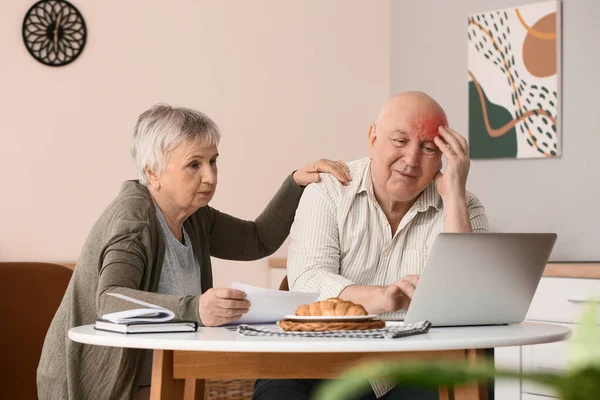 Senior Man Suffering Headache His Wife Paying Bills Home — Stock Photo, Image