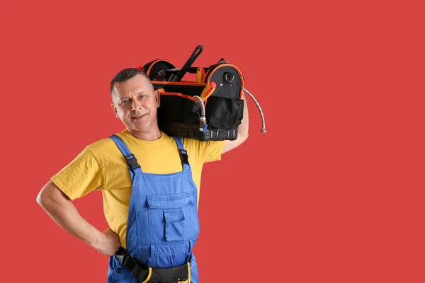 Handsome Plumber Tools Bag Color Background — Stock Photo, Image