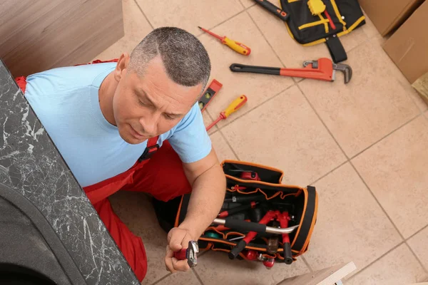 Plumber Repairing Sink Kitchen — Stock Photo, Image