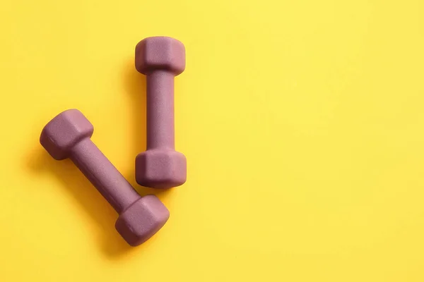 Stylish Dumbbells Yellow Background — Stock Photo, Image