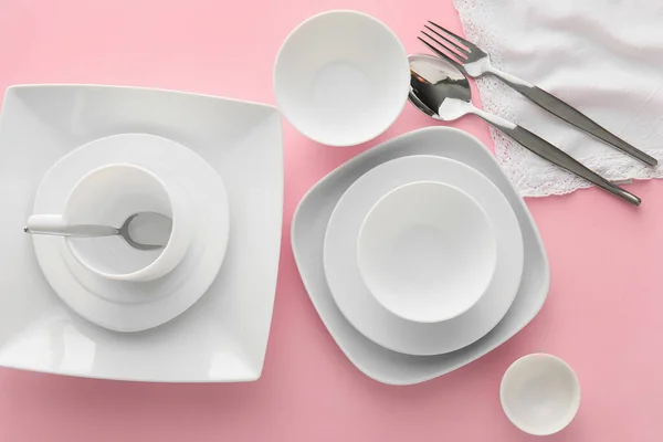 Set Stylish Dinnerware Pink Background — Stock Photo, Image