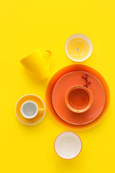 Set Stylish Dinnerware Yellow Background — Stock Photo, Image