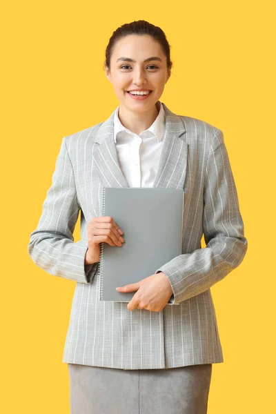 Pretty Young Businesswoman Folder Yellow Background — Stock Photo, Image