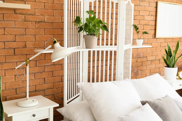 Folding Screen Houseplants Brick Wall Bedroom — Stock Photo, Image