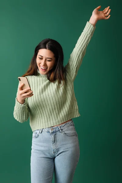 Happy Young Asian Woman Mobile Phone Green Background — Stock Photo, Image