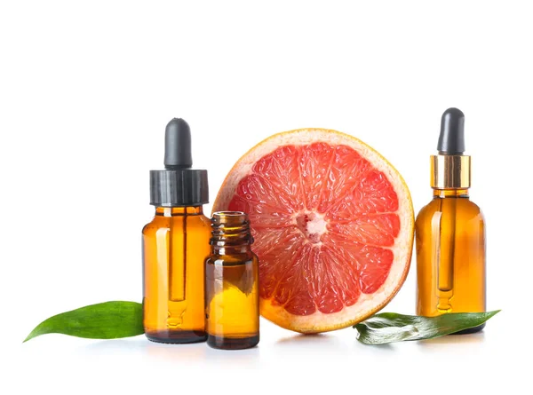 Bottles Essential Oil Half Grapefruit White Background — Stock Photo, Image