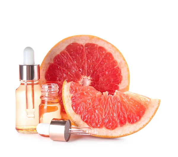 Bottles Essential Oil Grapefruit Pieces White Background — Stock Photo, Image