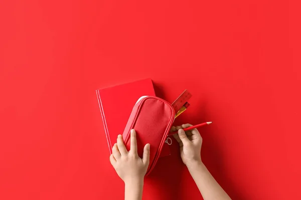 Child Hands Pencil Case Book Red Background — Stock Photo, Image