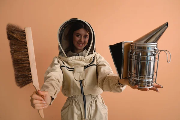 Female Beekeeper Protective Suit Brush Smoker Beige Background — Stock Photo, Image