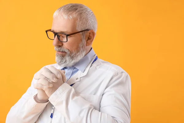 Mature Male Doctor Eyeglasses Yellow Background — Stock Photo, Image