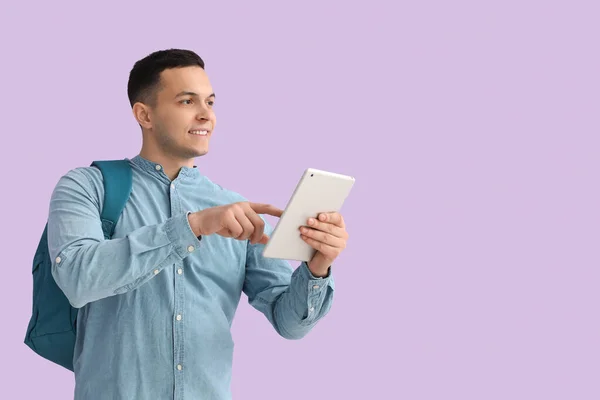 Male Student Using Tablet Computer Lilac Background — Stock Photo, Image