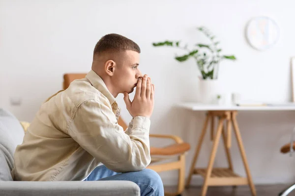 Troubled Young Man Sitting Sofa Home — Stock Photo, Image