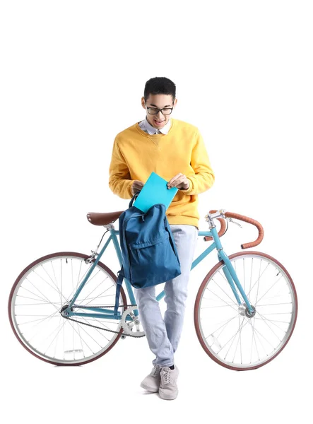 Αντρας Ασιάτης Φοιτητής Copybook Σακίδιο Πλάτης Και Ποδήλατο Λευκό Φόντο — Φωτογραφία Αρχείου