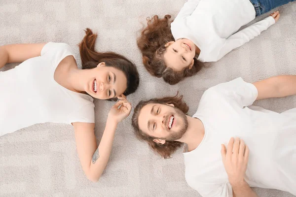 Young Family Lying Soft Carpet Home — Stock Photo, Image