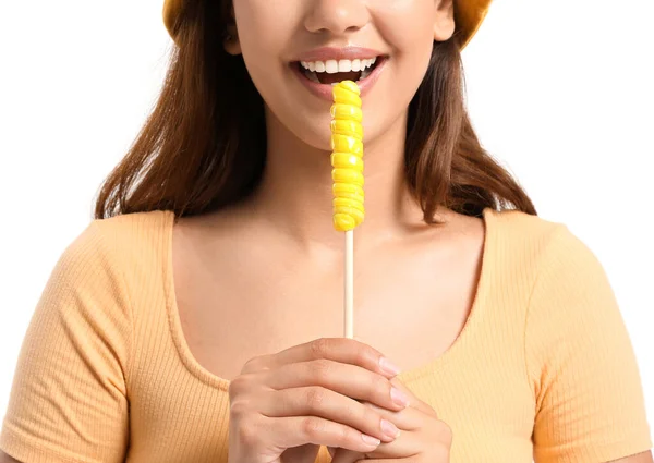 白底黄棒棒糖的年轻女人 — 图库照片