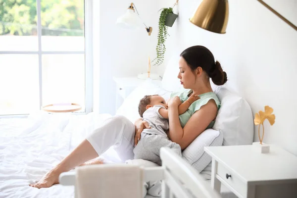 Beautiful Young Mother Breastfeeding Her Adorable Baby Bed — Stock Photo, Image