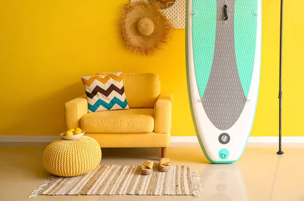 Interior Room Comfortable Armchair Board Sup Surfing Yellow Wall — Stock Photo, Image
