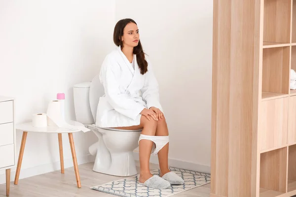 Young Woman Bathrobe Sitting Toilet Bowl Home — Stock Photo, Image