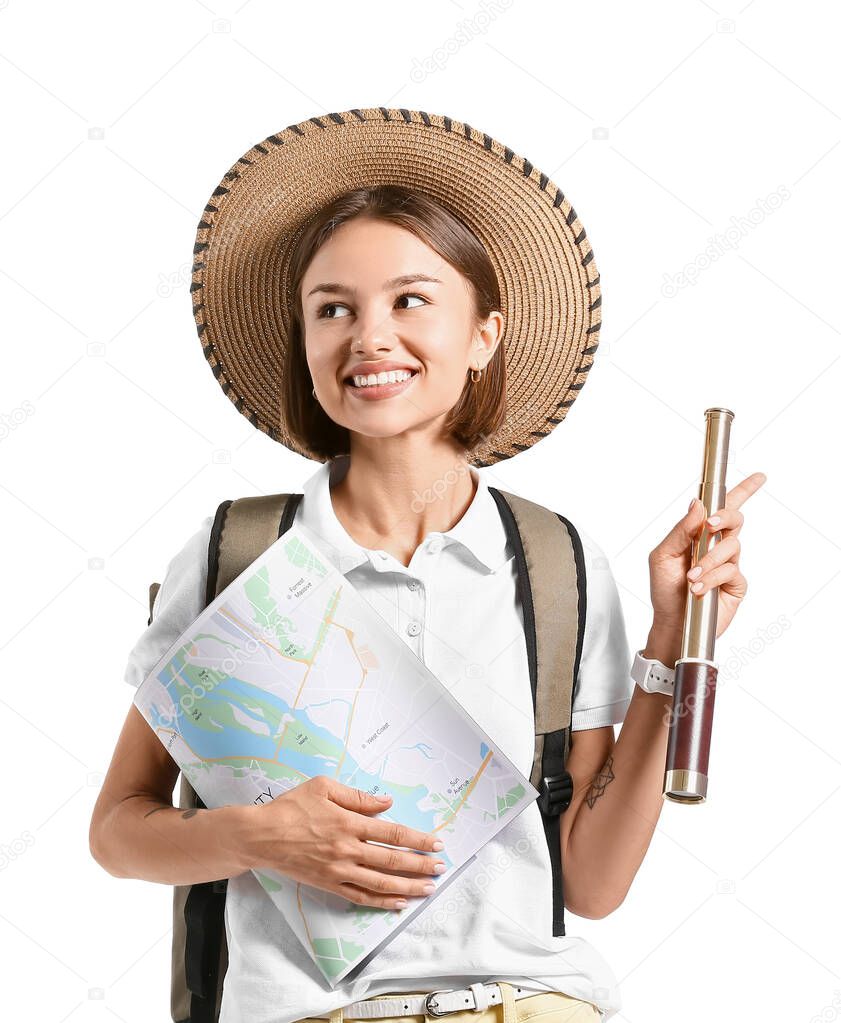 Female tourist with map and spyglass on white background