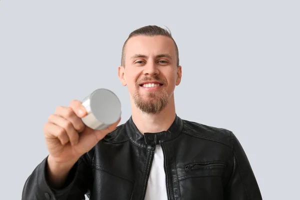 Young Smiling Man Modern Wireless Portable Speaker Grey Background — Stock Photo, Image