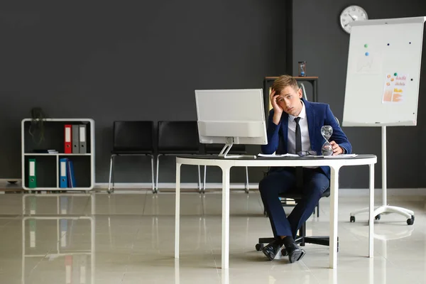 Tired Young Businessman Hourglass Sitting Table Office — Stock Photo, Image