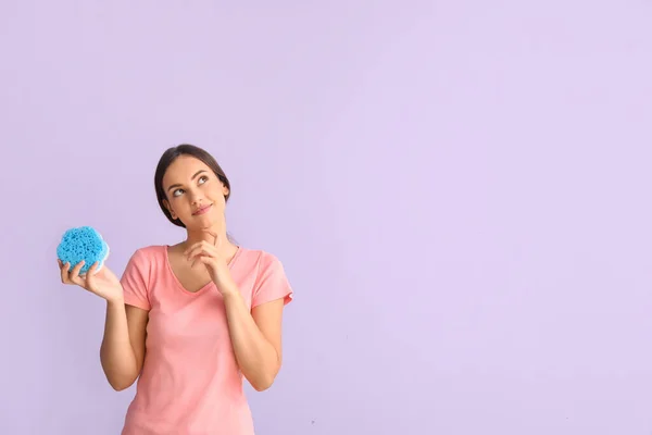 Thoughtful Young Woman Sponge Color Background — Stock Photo, Image